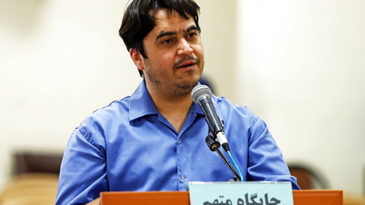 In this June 2, 2020 file photo, journalist Ruhollah Zam speaks during his trial at the Revolutionary Court, in Tehran, Iran