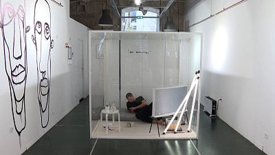 Artist Gaetan Marron in his cube for his project "Non essential"