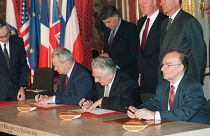  Serbian president Slobodan Milosevic, Bosnian President Alija Izetbegovic (C) & Croatian President Franjo Tudjman sign the Dayton peace deal on 14 December 1995 in Paris