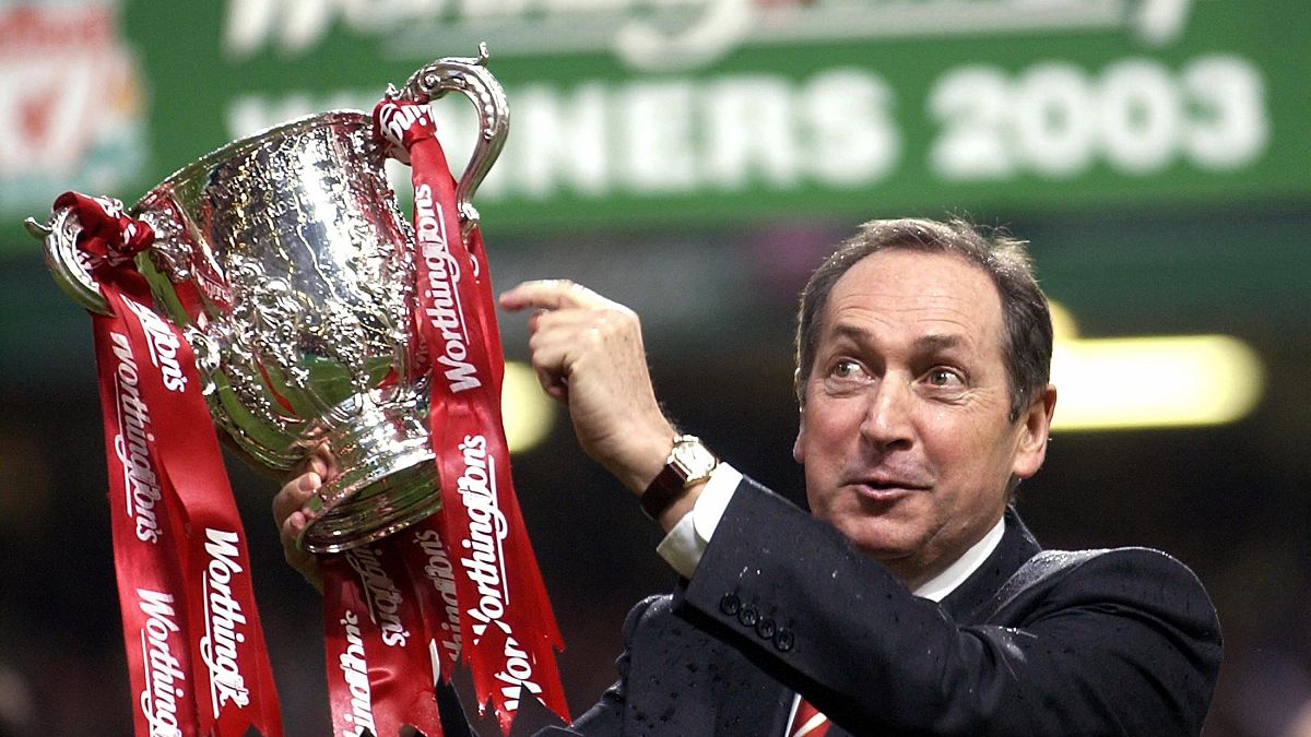 Gerard Houllier celebrates victory for Liverpool over Manchester United in the Worthington (League) Cup Final, March 2, 2003.