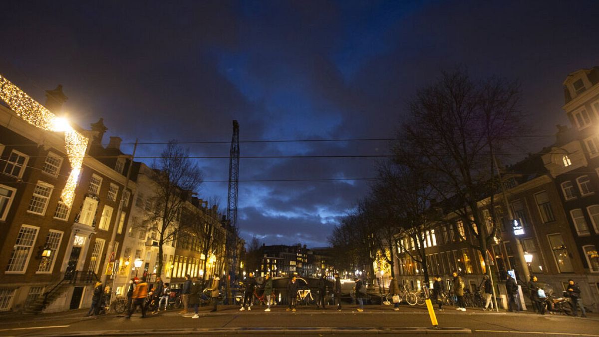 Long queues formed outside Amsterdam coffee shops and museums on Monday