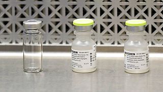 file photo shows vials used by pharmacists to prepare syringes