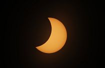 Spectators brave heavy rain to see solar eclipse in Chile