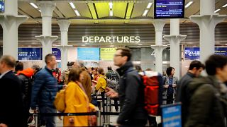 Passengers wait to board the international high-speed Eurostar train to Paris at St Pancras International railway station in London, on February 1, 2020. 
