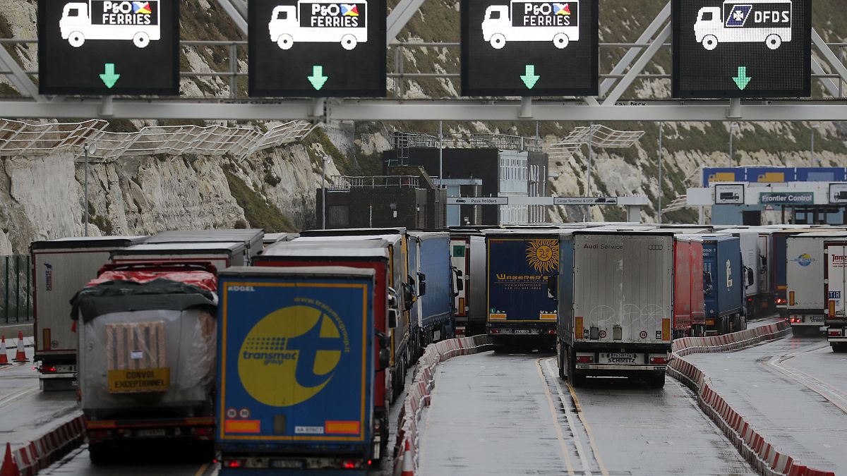 Lorries queue at the port in Dover, Friday, Dec. 11, 2020. The U.K. left the EU on Jan. 31, but remains within the EU single market and customs union until Dec. 31.