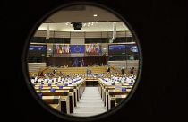 A general view through the door of the hemicycle at a plenary session of the European Parliament