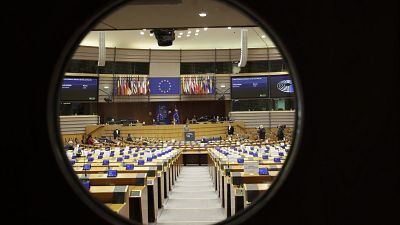 A general view through the door of the hemicycle at a plenary session of the European Parliament 