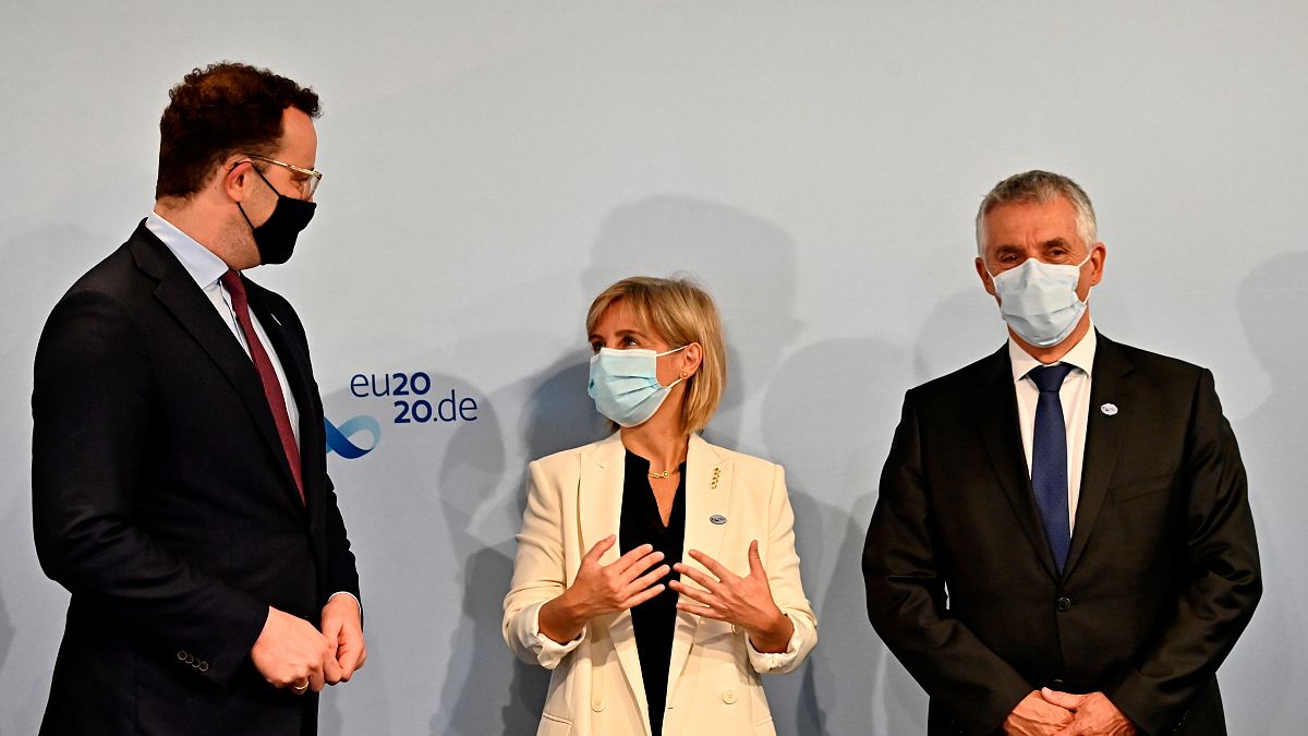  Slovenia's Tomaz Gantar, right, before a joint video conference with EU health ministers in Berlin, Germany, Thursday, July 16, 2020.