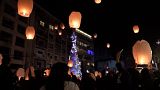 Lanterns launched into the sky during the lighting of a Christmas tree in memory of the victims of the devastating Port of Beirut explosion in August
