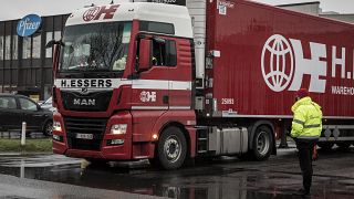 Trucks wait outside of loading bays at Pfizer Manufacturing in Puurs, Belgium on Monday, Dec. 21, 2020. 