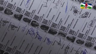 Bangui residents collect voter cards despite CAR vote uncertainty