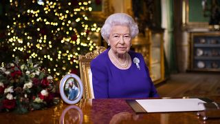 In this undated photo issued on Friday Dec. 25, 2020, Britain's Queen Elizabeth II records her annual Christmas broadcast in Windsor Castle, Windsor, England.