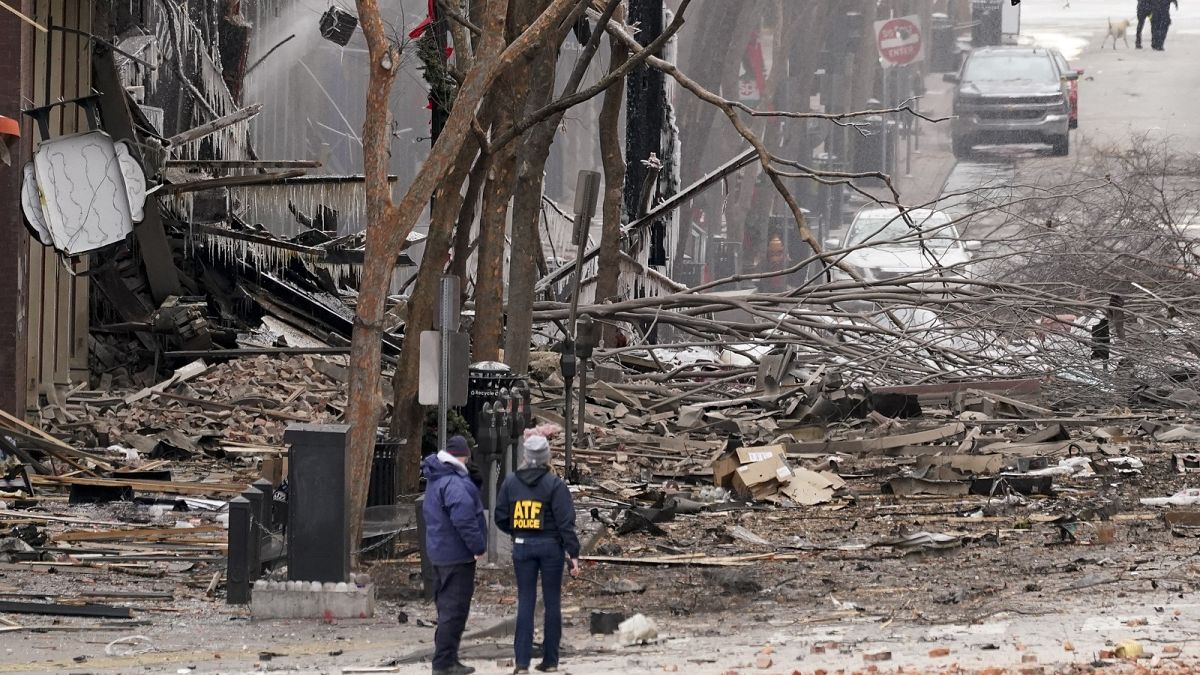 Emergency personnel work near the scene of an explosion in downtown Nashville, Tenn., Friday, Dec. 25, 2020.