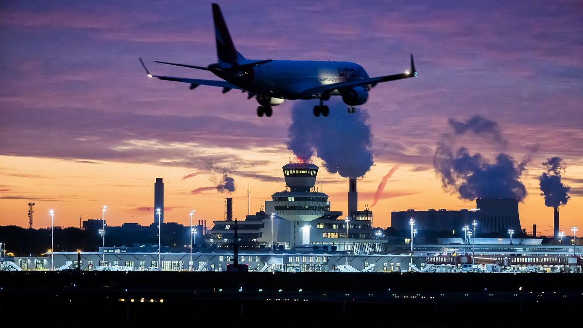 An aircraft lands at Berlin-Tegel airport in Germany on Nov. 5, 2020.