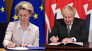 Ursula von der Leyen (L) and Uk Prime Minister Boris Johnson sign the EU-UK Trade and Cooperation Agreement on December 30, 2020.