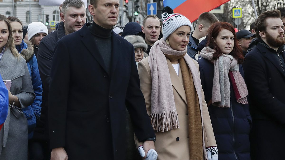 Алексей Навальный с женой на демонстрации в Москве в марте 2020 года. 