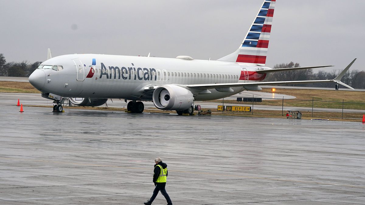 FILE - In this Dec. 2, 2020 file photo, an American Airlines Boeing 737 Max jet plane is parked at a maintenance facility in Tulsa, Oklahoma.