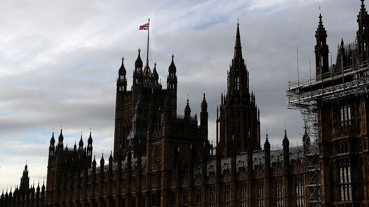 A Union Jack flag flies on top of Parliament during the debate in the House of Commons on the EU (Future Relationship) Bill in London, Wednesday, Dec. 30, 2020.