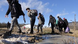 Migrants leave to be relocated from the Lipa camp northwestern Bosnia, near the border with Croatia, Bosnia, Tuesday, Dec. 29, 2020.