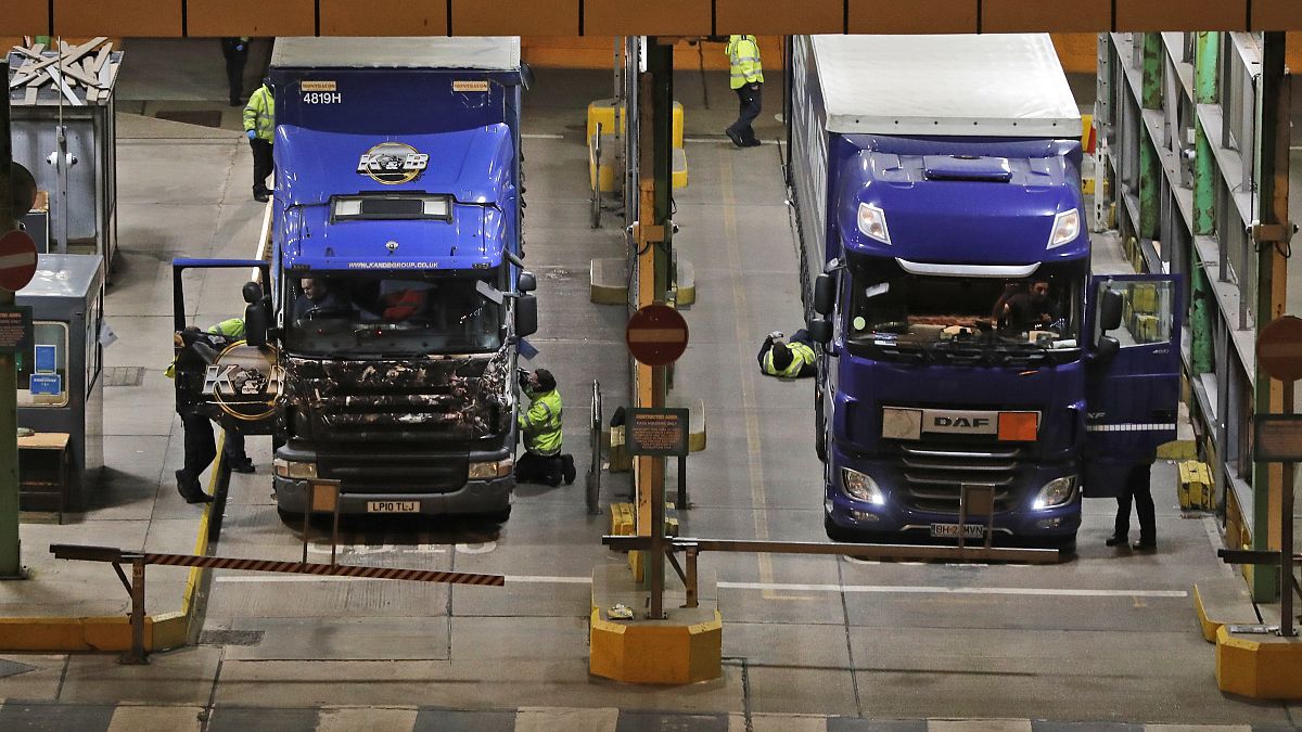 Lorries that arrived after the end of the transition period with the European Union are checked at the port in Dover, England, Thursday, Dec. 31, 2020. 