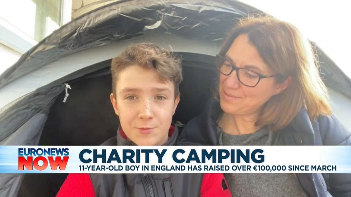 Max Woosey and his mother Rachael speaking from their tent in Braunton, England, Jan 1, 2021