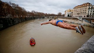 One of the divers takes the plunge on New Year's Day