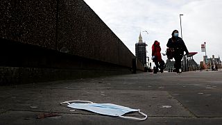 A mask on the pavement near the entrance of a hospital on Westminster Bridge in London this week