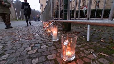 Candles inside beer glasses in protest against the closing of pubs and restaurants in the country.