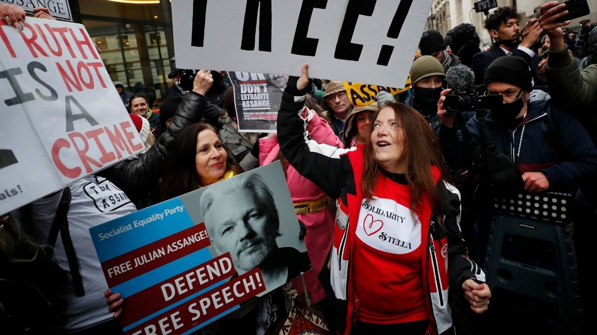Julian Assange supporters celebrate outside the Old Bailey in London