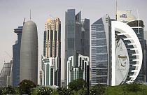 In this May 5, 2018 photo, a giant image of the Emir of Qatar Sheikh Tamim bin Hamad Al Thani, adorns a tower in Doha, Qatar.