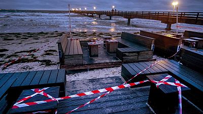 A beach bar is closed due to the lockdown at the pier in Scharbeutz, northern Germany, Tuesday, Jan. 5, 2021.
