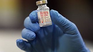 A vial of the Moderna COVID-19 vaccine is displayed at a pop-up vaccine clinic for EMS workers Center Tuesday, Jan. 5, 2021, in Salt Lake City