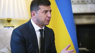 Ukraine President Volodymyr Zelensky, gestures as he talks to Britian's Prime Minister Boris Johnson, during a meeting, in Downing Street, London, Thursday, Oct. 8, 2020. 