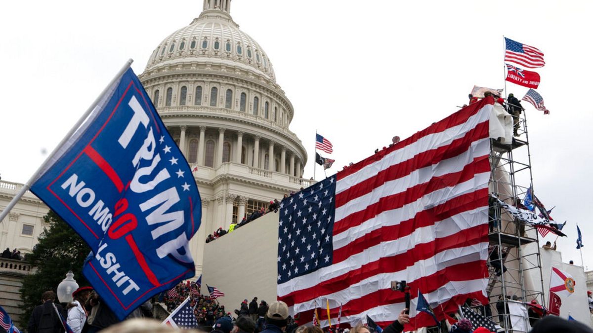 Supporters of President Donald Trump storm the steps of the West side of the the U.S. Capitol on Wednesday, Jan. 6, 2021, in Washington, DC.