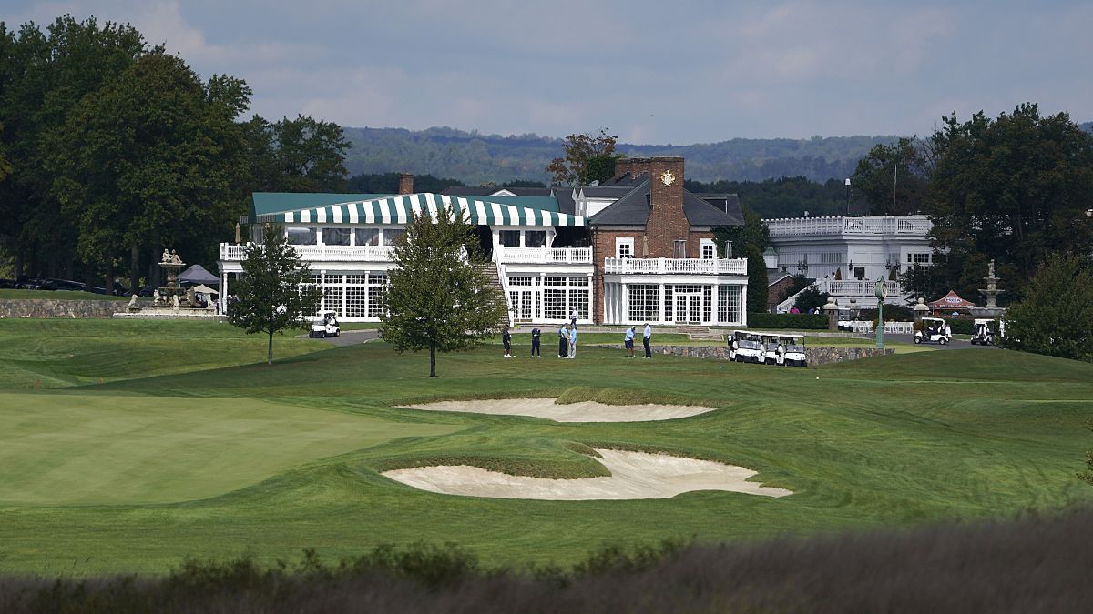 FILE - In this Friday, Oct. 2, 2020, file photo, golfers play golf at Trump National Golf Club in Bedminster, N.J.