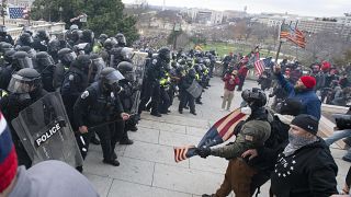 U.S. Capitol Police push back demonstrators who were trying to enter the U.S. Capitol on Wednesday, Jan. 6, 2021, in Washington.