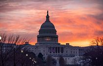 Dawn breaks at the Capitol in Washington, Monday, Jan. 11, 2021.