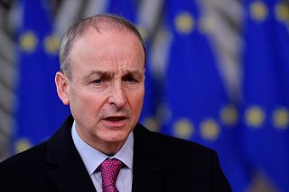 FILE - In this file photo dated Thursday, Dec. 10, 2020, Ireland's Prime Minister Micheal Martin speaks as he arrives at the European Council building in Brussels.