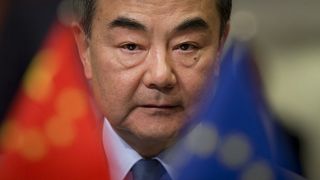 China's Foreign Minister Wang Yi waits for the start of a meeting between the EU and China at the EU Council building in Brussels, Monday, March 18, 2019.