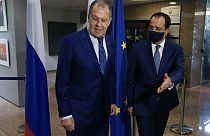 Russian Foreign Minister Sergey Lavrov, left, is greeted by his Cypriot counterpart Nikos Christodoulides