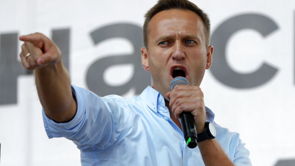 In this Saturday, July 20, 2019 file photo, Russian opposition activist Alexei Navalny gestures while speaking to a crowd during a political protest in Moscow