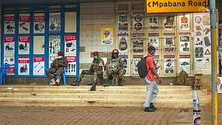 Security forces patrol the streets near opposition leader Bobi Wine headquarters in Kampala, Uganda Wednesday, Jan. 13, 2021.