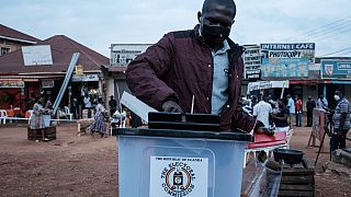 Ugandans Line Up to Cast their Ballots in Charged Election