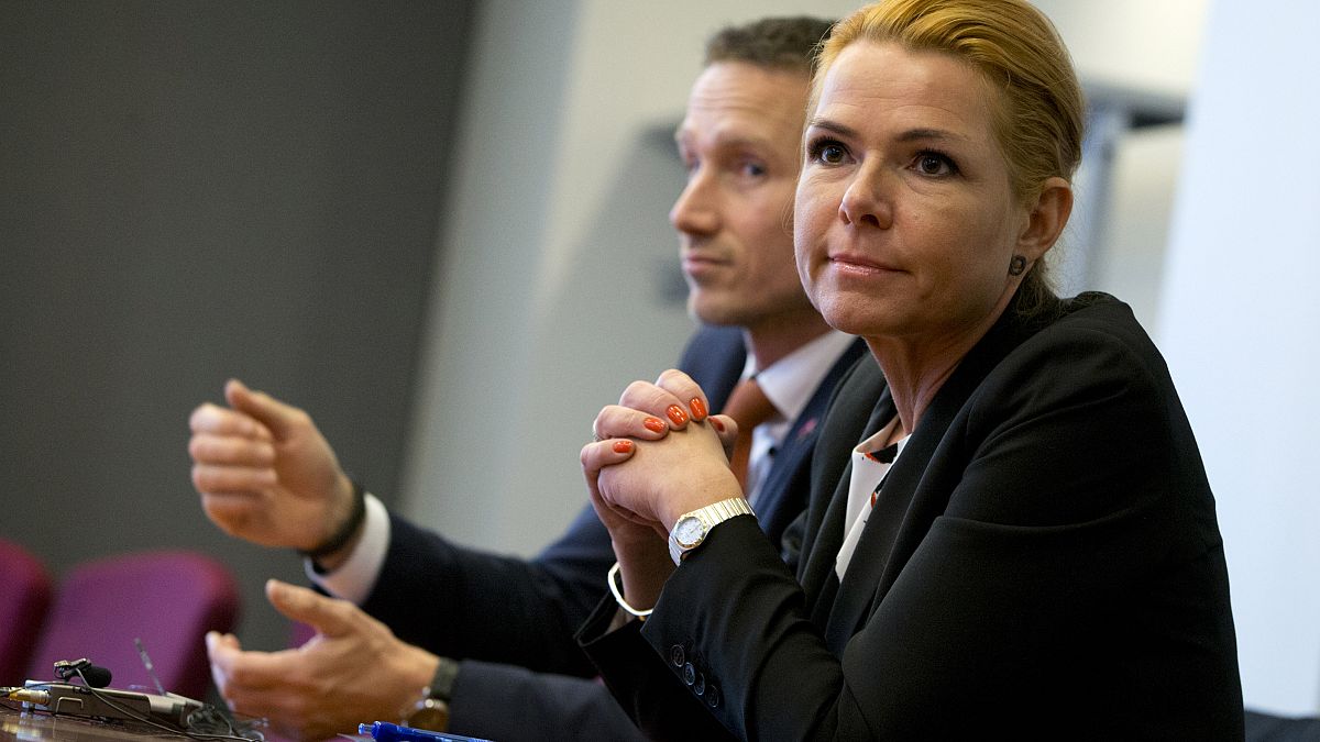 FILE: Danish Minister for Immigration Inger Stojberg (right) speak with the media prior to a meeting at the European Parliament in Brussels on Monday, Jan. 25, 2016.