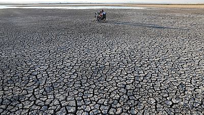 Cracked soil after a drought at Dikilitas Pond in the Golbasi district of Ankara in July 2020.