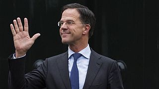 In this March 15, 2019, file photo, Dutch Prime Minister Mark Rutte waves as he waits for European Council President Donald Tusk