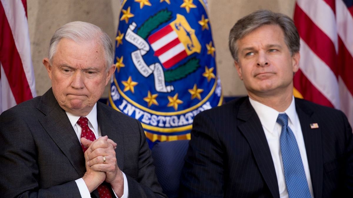 Attorney General Jeff Sessions sits with FBI Director Chris Wray