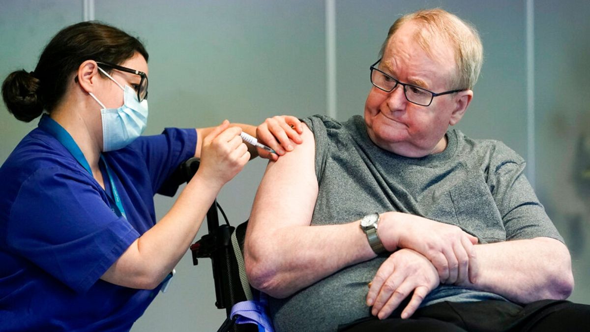 Svein Andersen was the first in Norway to receive the coronavirus vaccine in the capital Oslo, Sunday, Dec. 27, 2020.