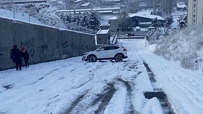 Car skidding down a hill