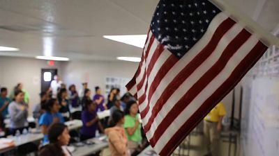 Bandera estadounidense en un aula. Imagen de archivo